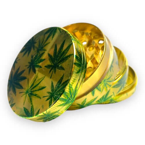 golden grinder with green leaves - cross section